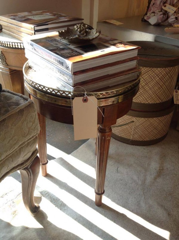 love the gallery tray feel to this petite french table and its bigger sibling in back...makes them akin to nesting tables