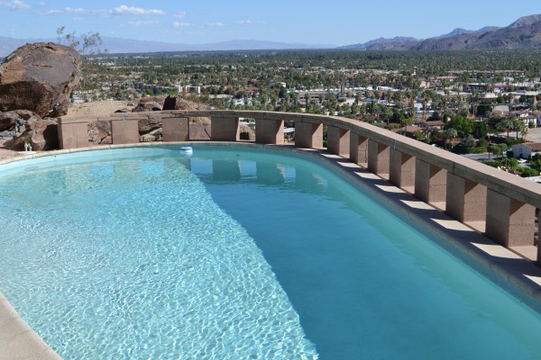 the pool where he notably swam nude...he had a cowbell at the entrance that you were supposed to "ring" to warn him to throw some pants on