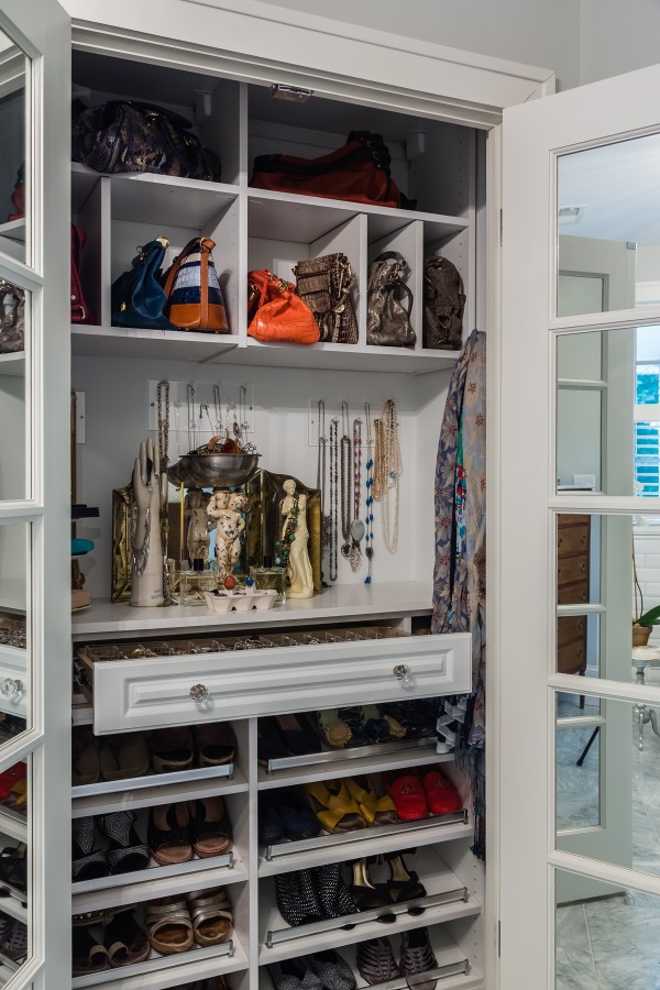 master bedroom accessories purse and shoe closet.