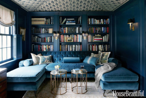 Blue velvet tufted sofa