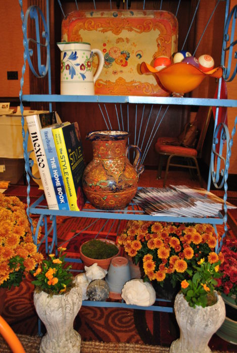 Outdoor etagere shelf with fall mums