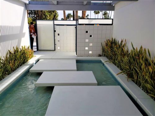 outdoor water feature with walkway over water