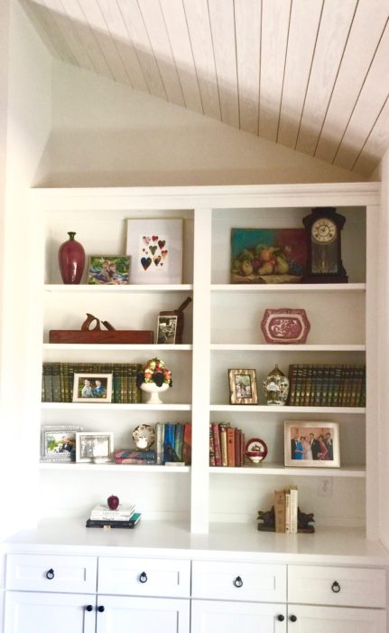 bookshelf styling family mementoes