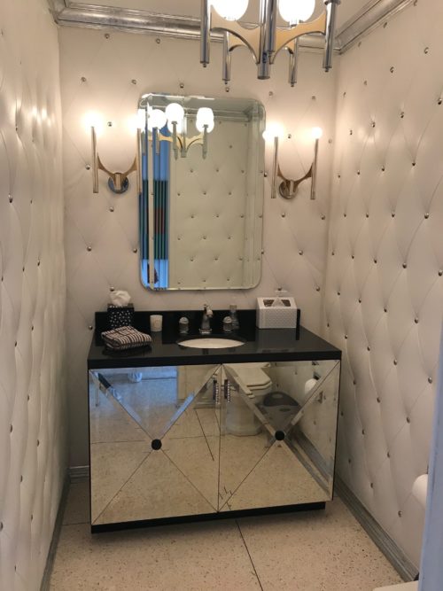 powder room tufted leather walls