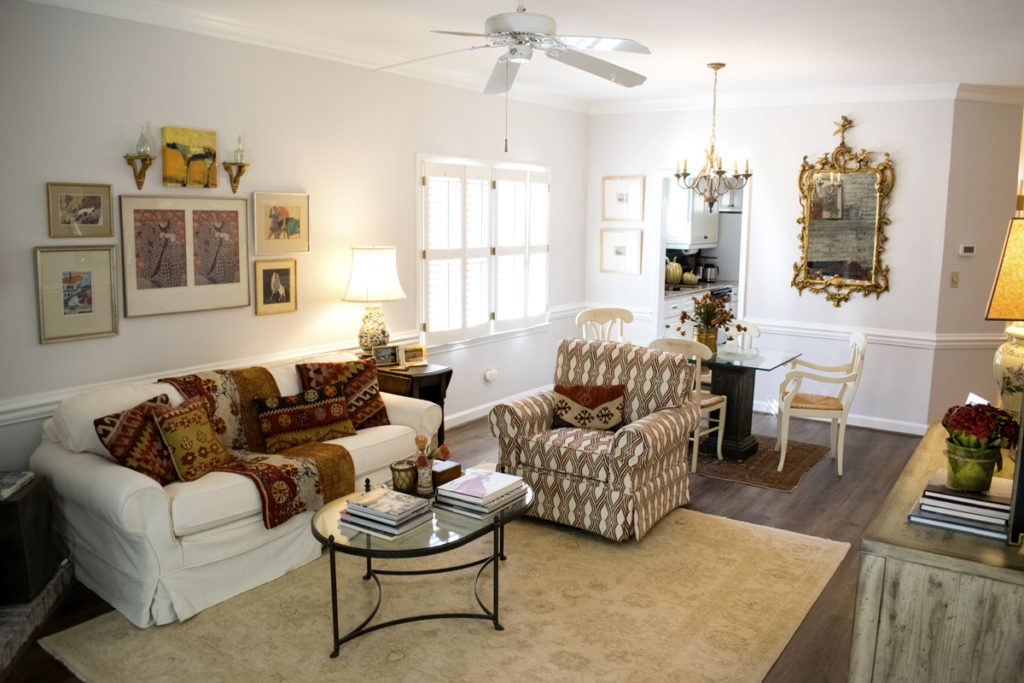 living room wood floors white sofa metal glass coffee table