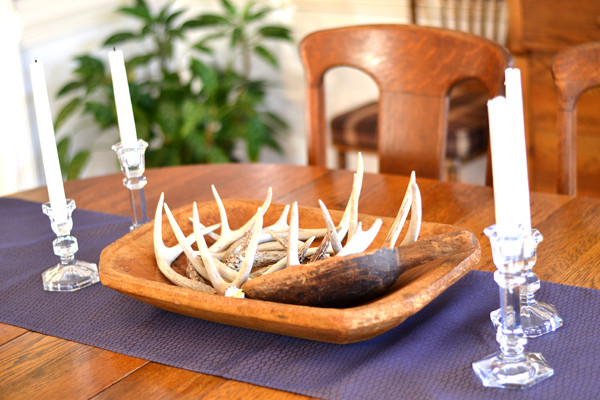 dining centerpiece deer antlers in wooden dough bowl